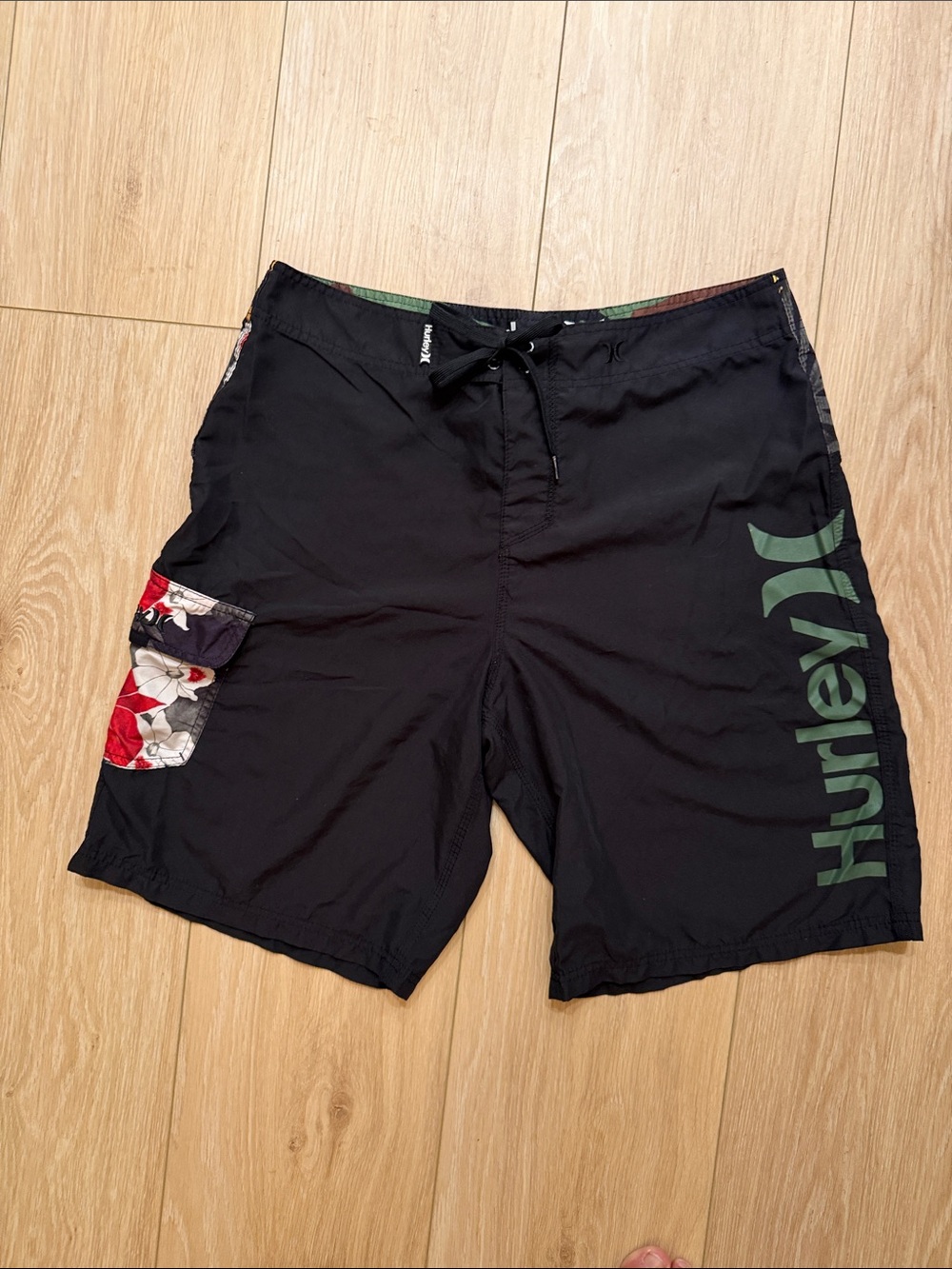 Hurley Black Board Shorts with Green Logo and Red Floral Pocket